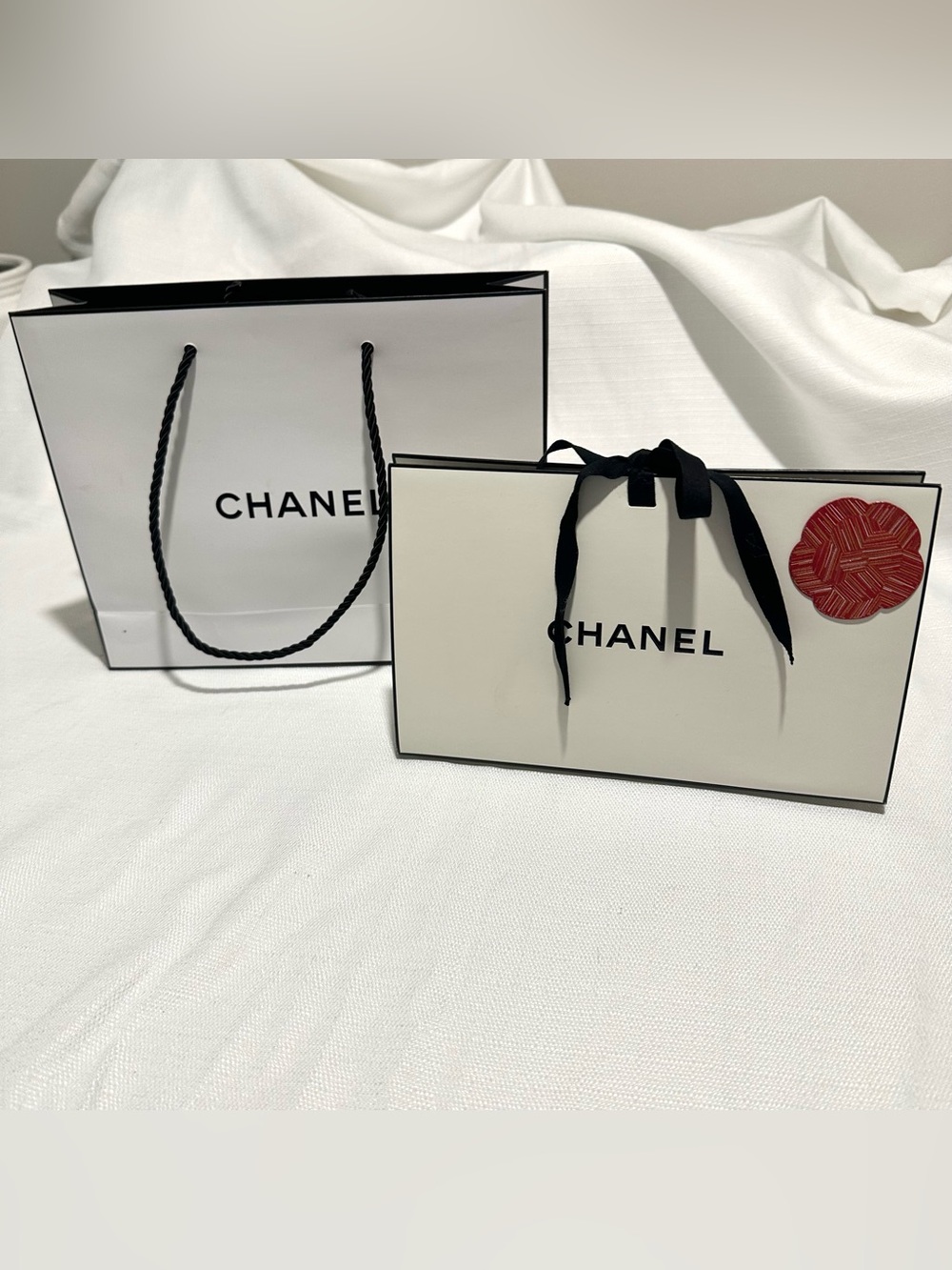 Authentic Chanel shopping bag lot with medium and small gift bags